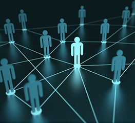 grupa cyfrowych ludzików na ciemnym tle